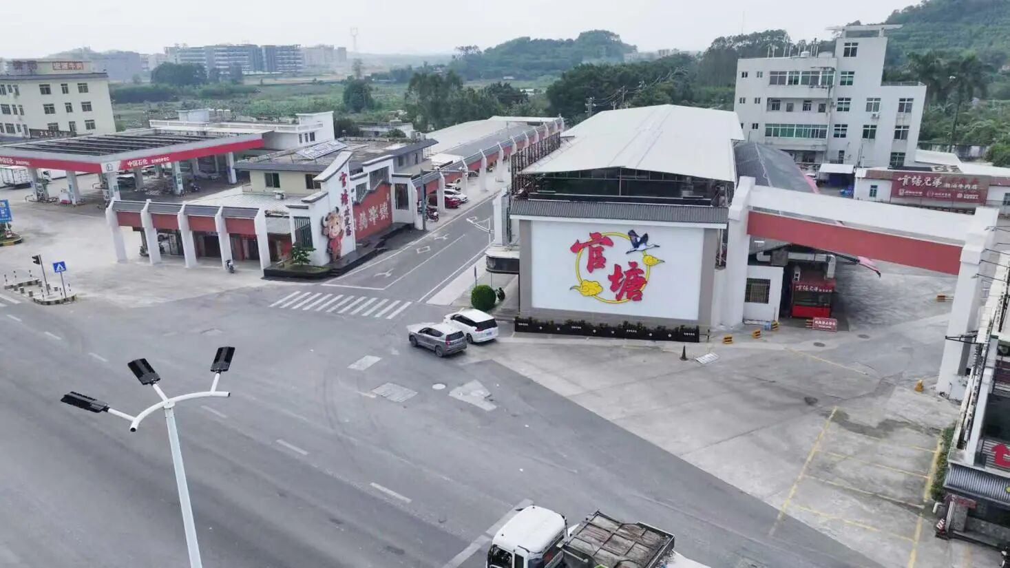 安博体育平台官塘镇：“七个一”建设绘就美丽圩镇新画卷(图1)