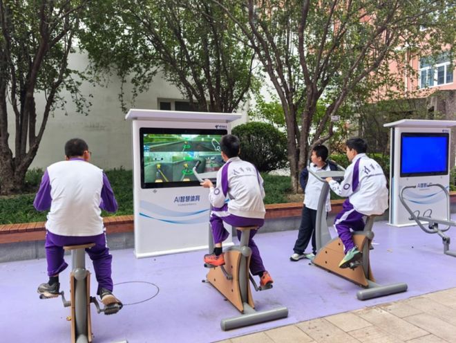 新华财经“单车”胜“赛安博体育平台车”室内能“划船”——“AI+体育”让运动更有趣(图2)